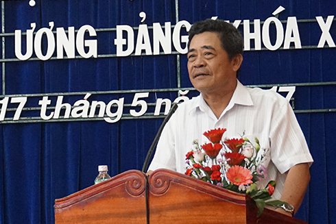 Ông Lê Thanh Quang báo cáo tại hội nghị.