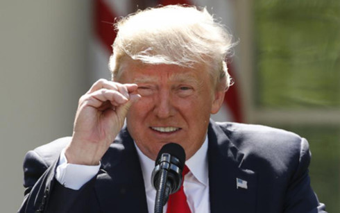 Tại cuộc họp báo tuyên bố rút khỏi Thỏa thuận Paris về Biến đổi khí hậu, Tổng thống Trump cho rằng mức tăng nhiệt độ của Trái Đất vô cùng khiêm tốn. Ảnh: Reuters.
