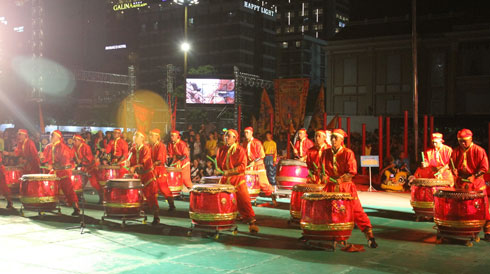 Performing with drums.