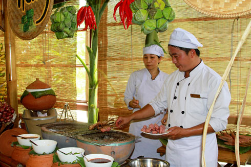 Chefs of White sand Doc Let Resort & Spa preparing typical dishes of Ninh Hoa.