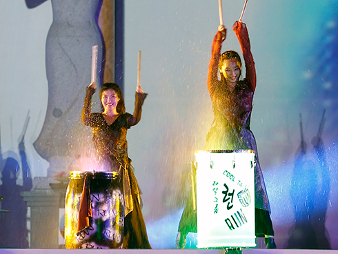 Artists from South Korea performing water drum.