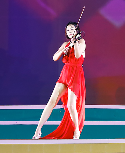 South Korean Jmi Ko performs violin.
