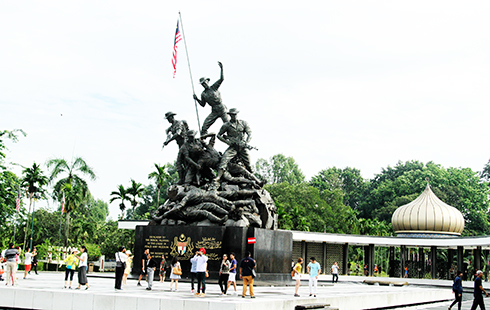 Tourists visiting National Monument in Malaysia