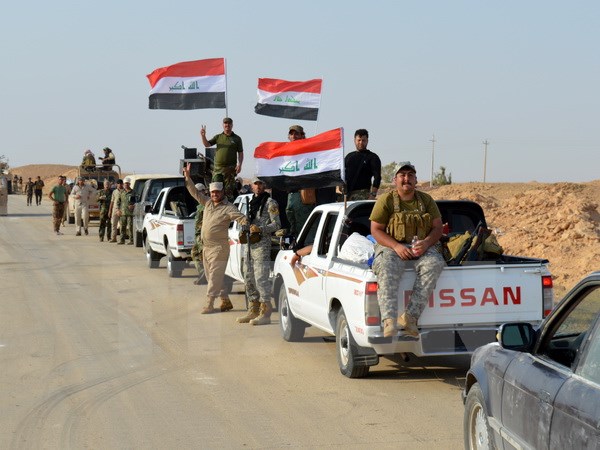 Các lực lượng Iraq tiến vào khu vực Anna, tỉnh Anbar trong chiến dịch chống IS ngày 19/9. (Nguồn: AFP/TTXVN)