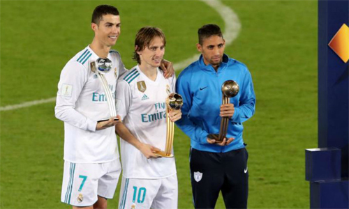 Modric (giữa) giành giải nhờ những nỗ lực kiến tạo cho đồng đội. Ảnh: Marca