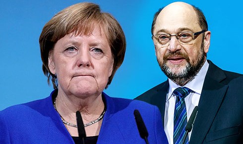 Đức đang đứng trước lựa chọn liên minh hoặc một cuộc bầu cử mới. Thủ tướng Đức Angela Merkel (trái) và lãnh đạo đảng Dân chủ Xã hội Martin Schulz. Ảnh:Daily Express