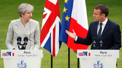 Thủ tướng Anh Theresa May (trái) và Tổng thống Pháp Emmanuel Macron sẽ thảo luận vấn đề nhập cư. Ảnh: Reuters