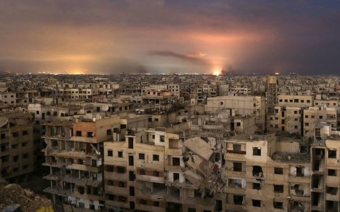 Đông Ghouta (Syria) bị tàn phá tan hoang trong các cuộc giao tranh. Ảnh: Reuters