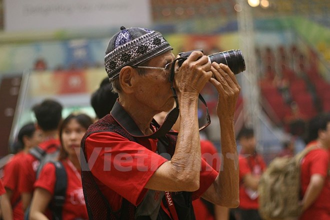 Một thí sinh quen thuộc của cuộc thi sáng tác ảnh nhanh của Canon tại khu vực Hà Nội. (Ảnh: Vietnam+)
