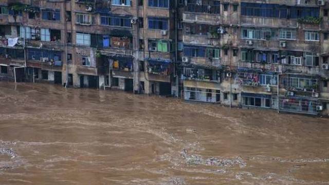 Một khu dân cư ở thành phố Trùng Khánh (Trung Quốc) bị lụt. (Ảnh: AP)