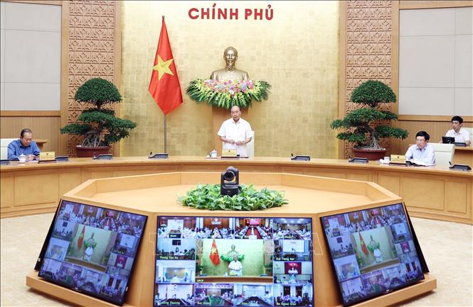 Thủ tướng Nguyễn Xuân Phúc phát biểu tại cuộc họp trực tuyến. Ảnh: Thống Nhất/TTXVN