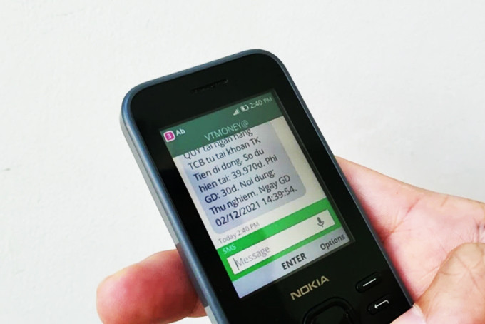 Một điện thoại  "cục gạch " có thể chuyển tiền qua Mobile Money