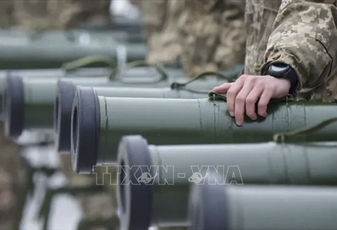 Quân nhân Ukraine tại lễ chuyển giao các thiết bị quân sự và vũ khí hạng nặng tại Kiev. Ảnh tư liệu: Getty Images/TTXVN